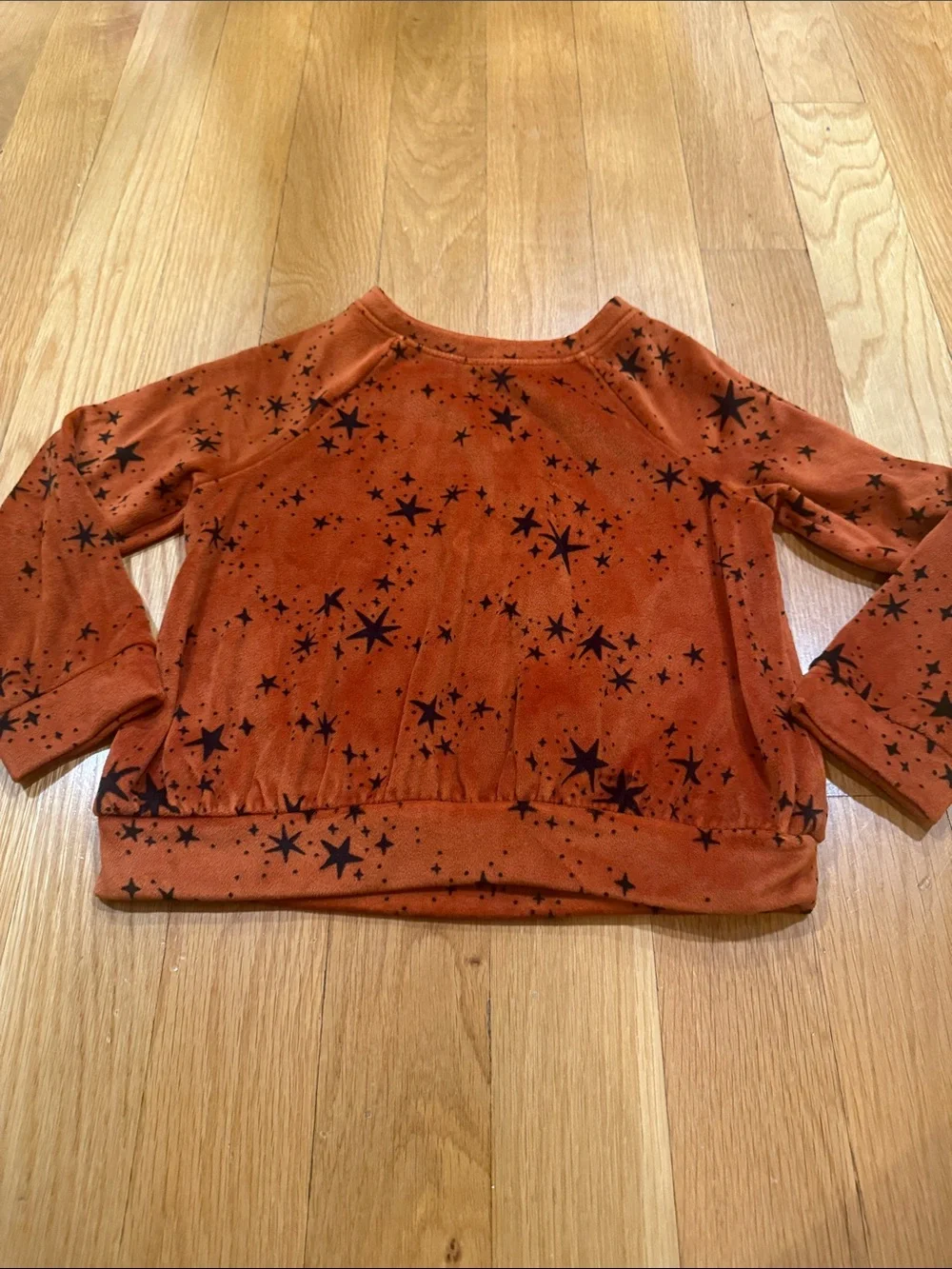 Cat & Jack rust orange velour set with black star pattern size xsmall.